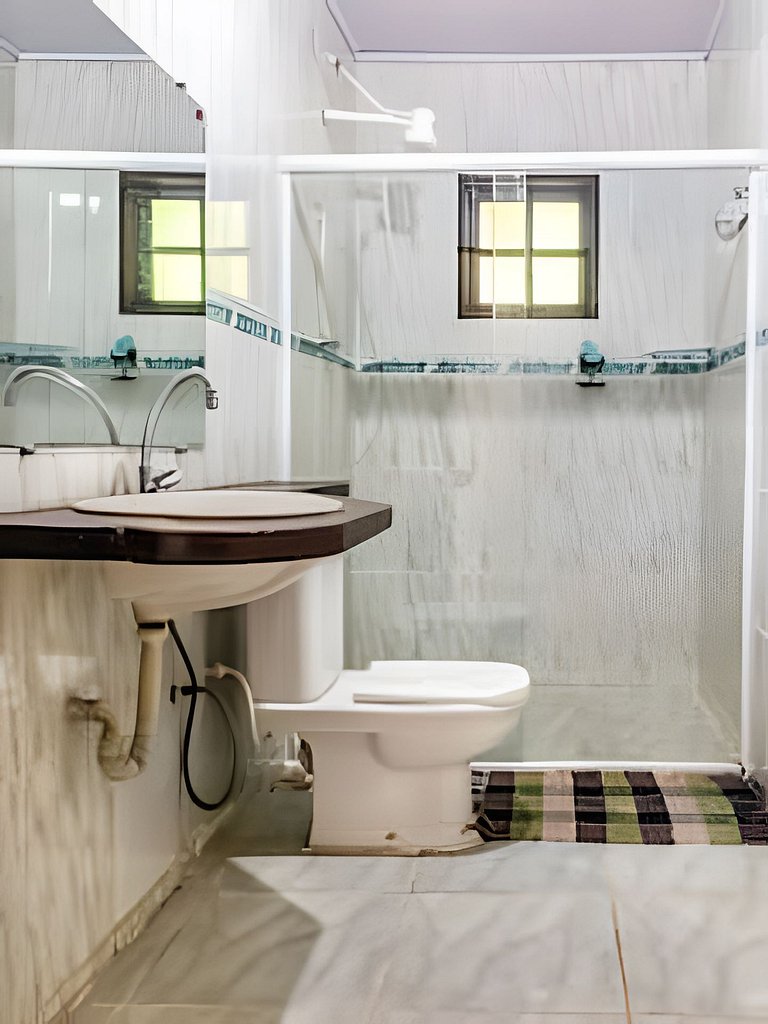 Casa com vista para o mar em meio a natureza