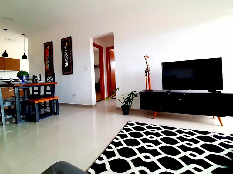 Apto em Itaguá, Ubatuba – Conforto & piscina no condomínio