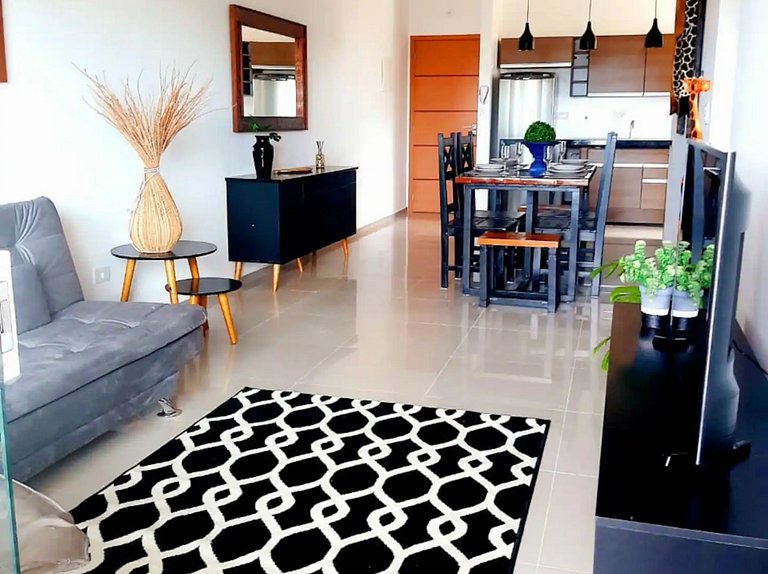 Apto em Itaguá, Ubatuba – Conforto & piscina no condomínio