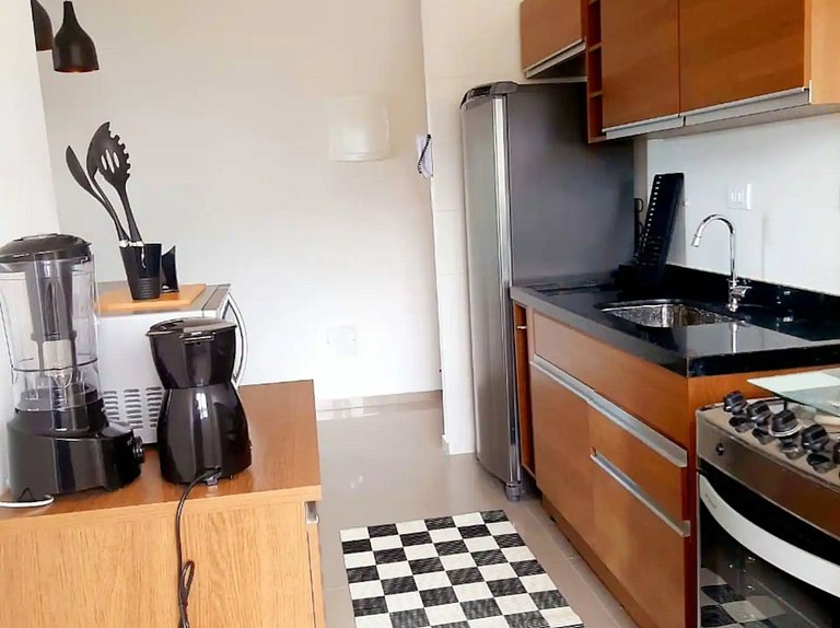 Apto em Itaguá, Ubatuba – Conforto & piscina no condomínio