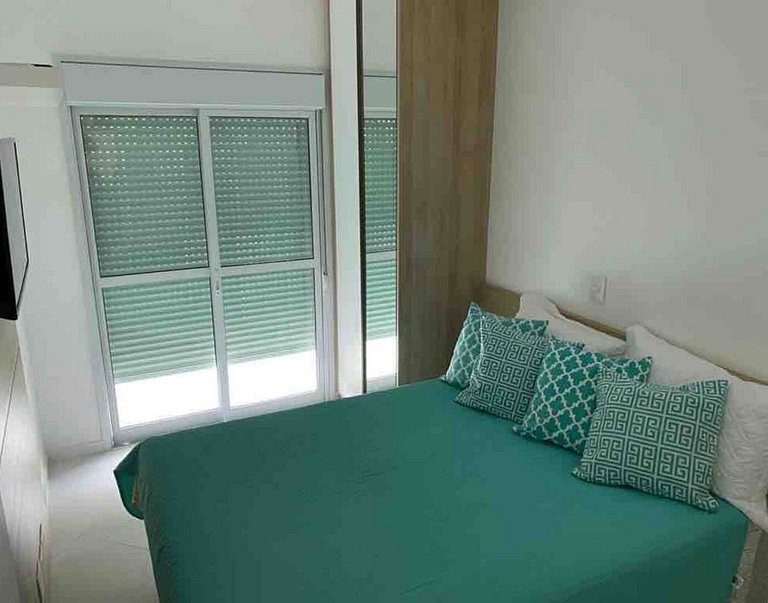 Apto Riviera – Varanda com churrasqueira a 500m da praia
