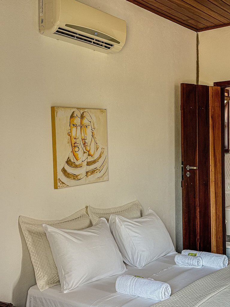 Suíte Hibisco | Suíte para casais perto do centro