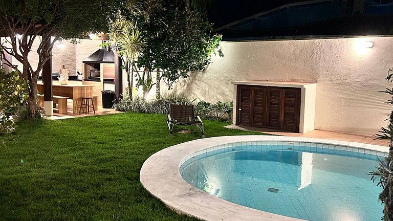 Casa Garoupas – 4 dormitórios em condomínio pé na areia