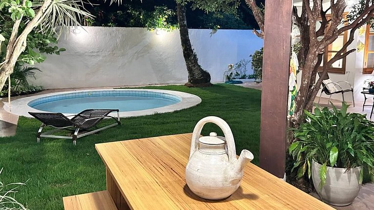 Casa Garoupas | 4 dorms em condomínio pé na areia
