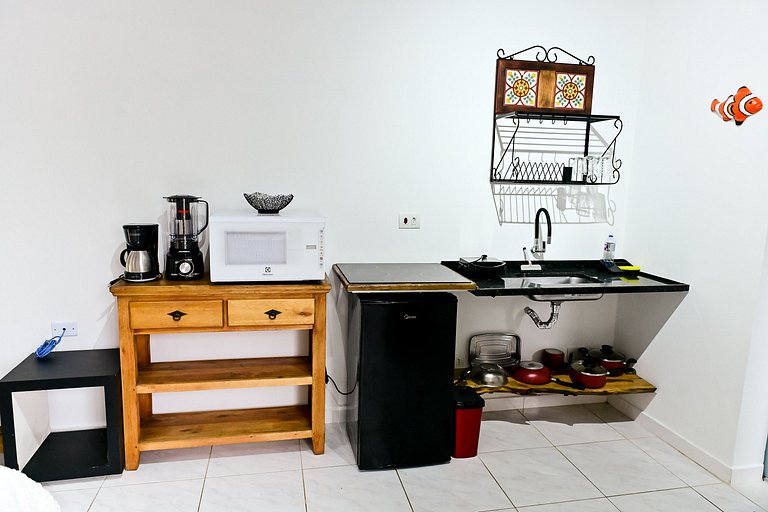 Ateliê & Suítes Feiticeira - suíte com cachoeira