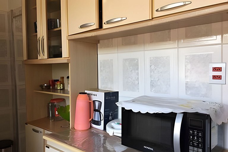 Refúgio Aconchego - 2 dorms com ar e quintal amplo