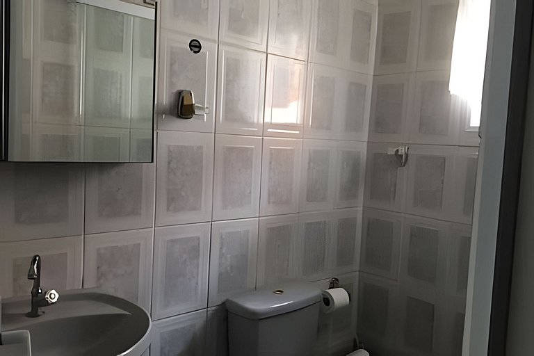 Refúgio Aconchego - 2 dorms com ar e quintal amplo