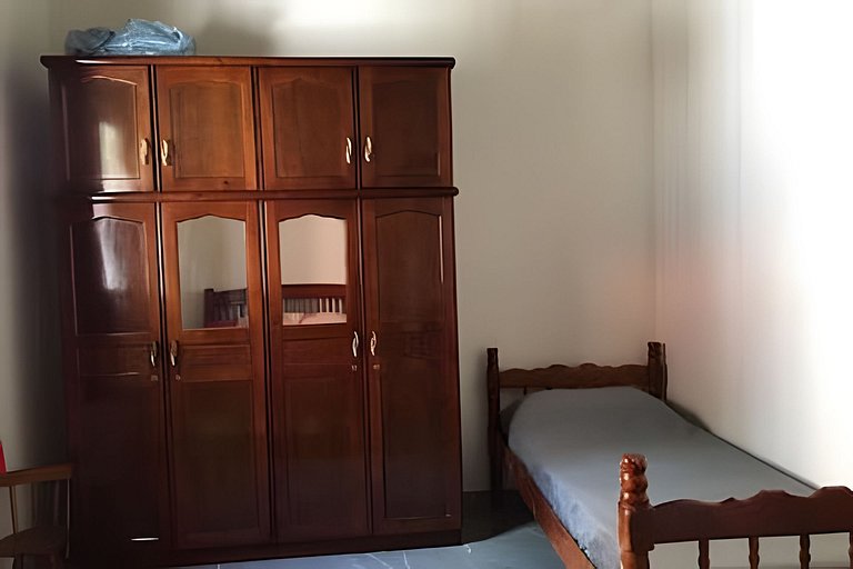 Refúgio Aconchego - 2 dorms com ar e quintal amplo