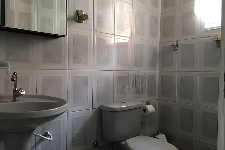 Refúgio Aconchego - 2 dorms com ar e quintal amplo