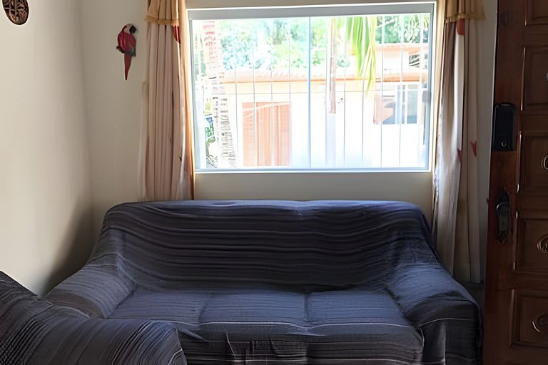 Refúgio Aconchego - 2 dorms com ar e quintal amplo