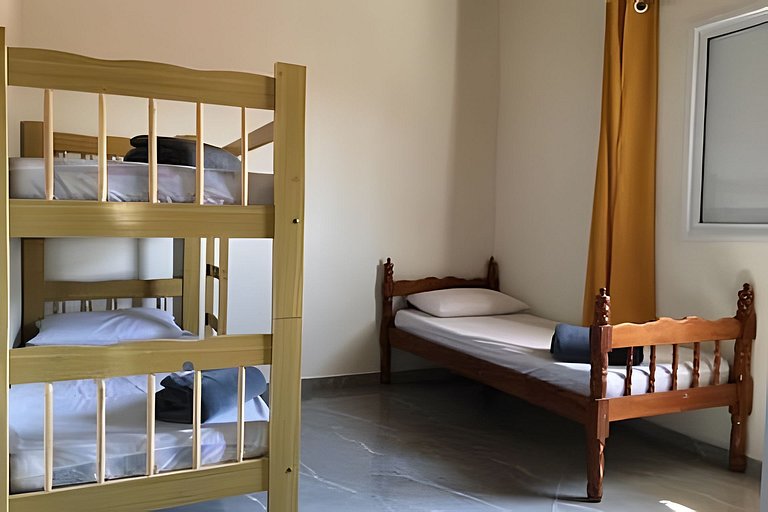 Refúgio Aconchego - 2 dorms com ar e quintal amplo